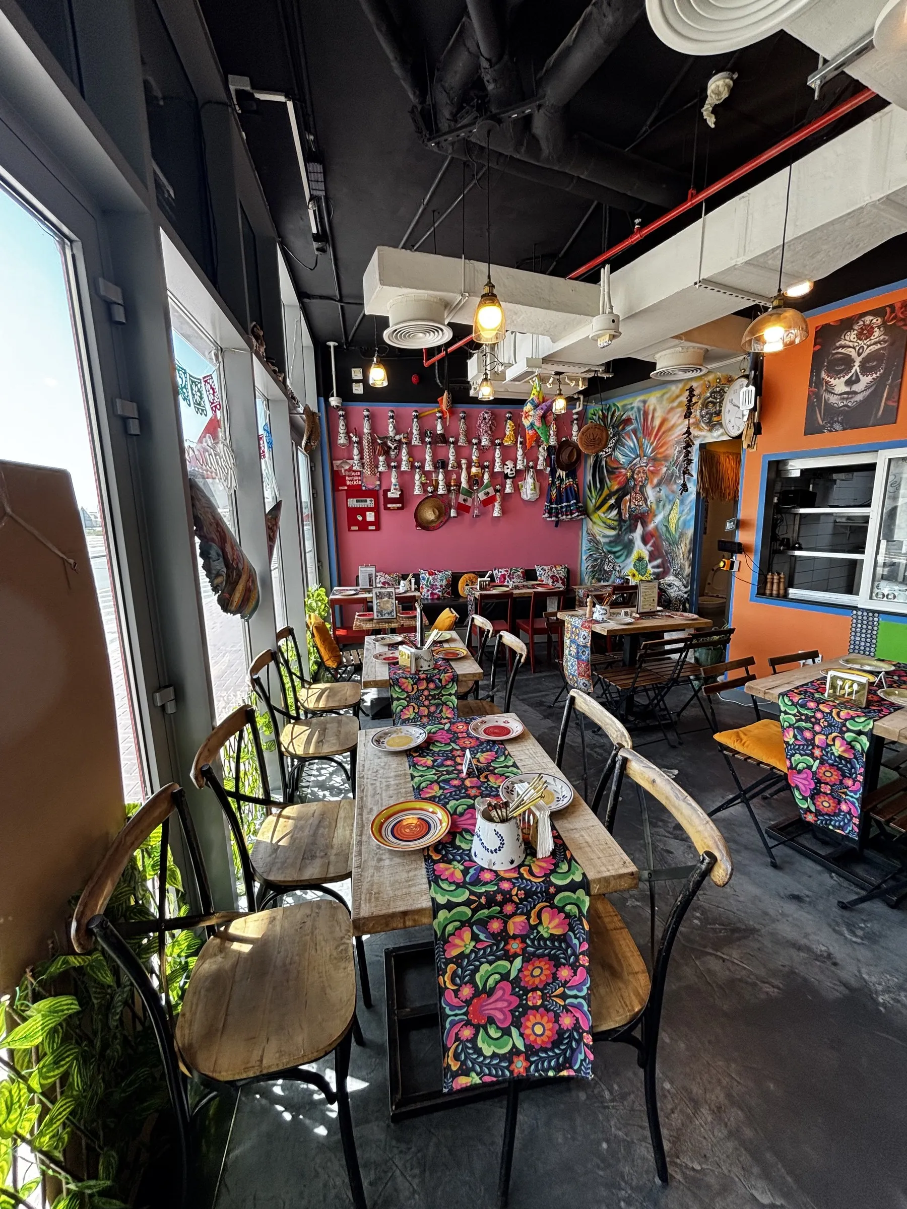 Querida dining room — twenty-six seats, family-paced